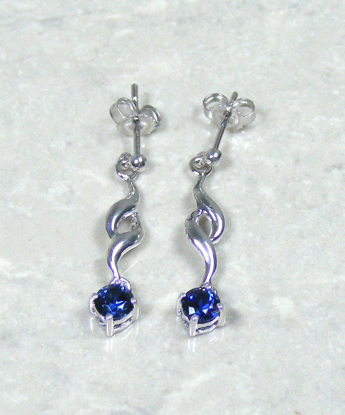 Mid Blue .69 Carat Sapphire Earrings